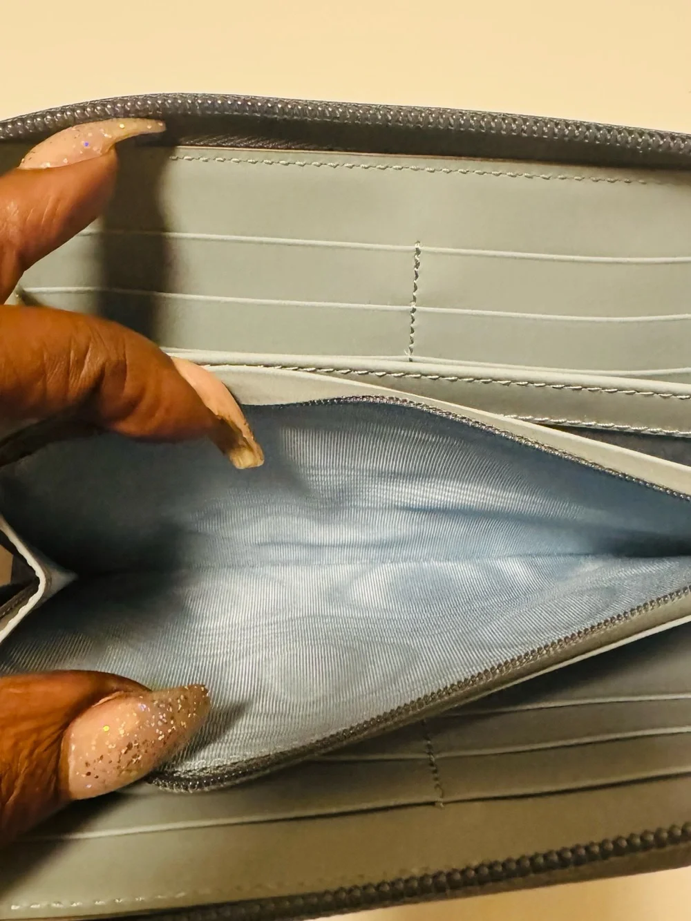 Gucci Light Blue Embossed GG Zip-Around Wallet